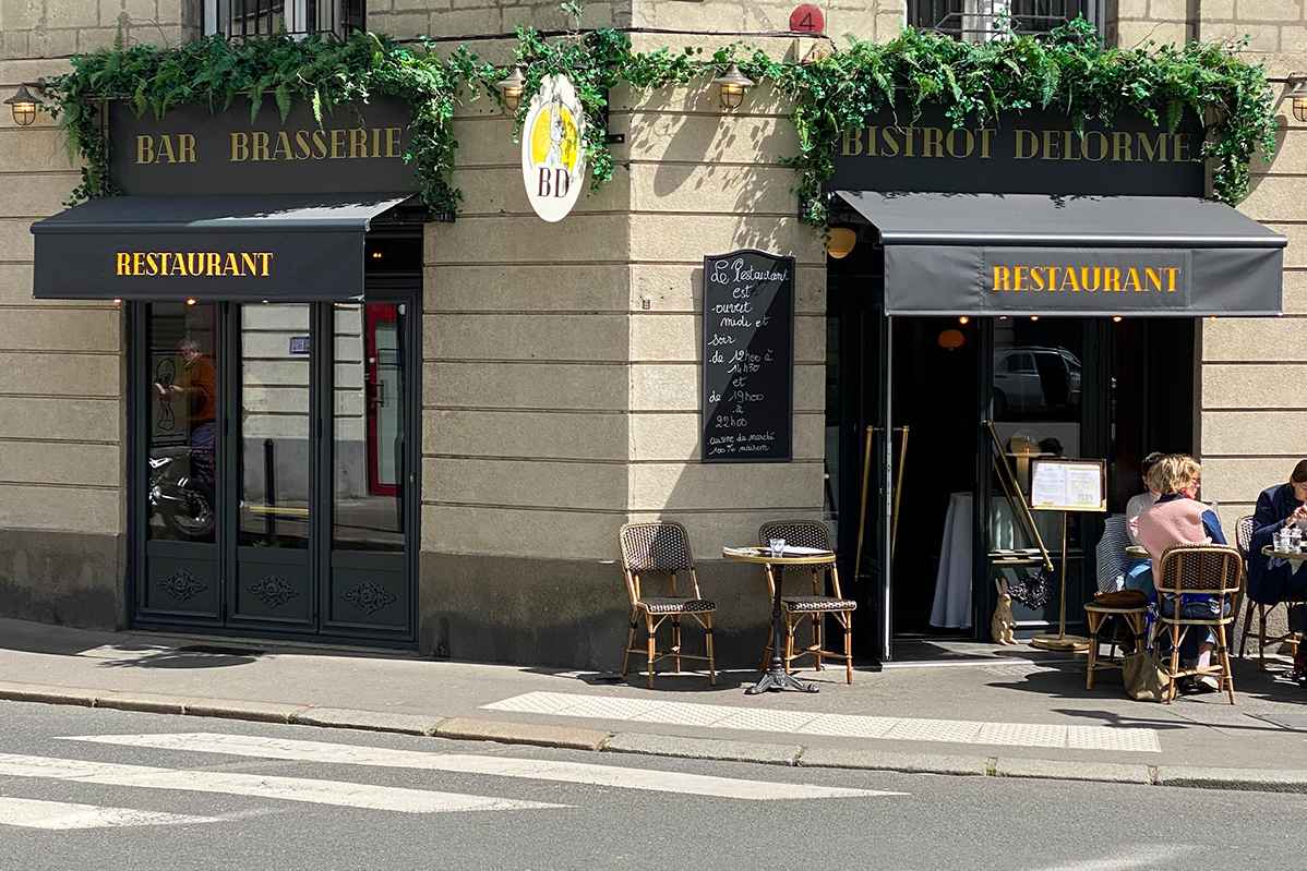 Store banne et lambrequin lumineux bar brasserie delorme nantes 44 espacio - Attribut alt par défaut.