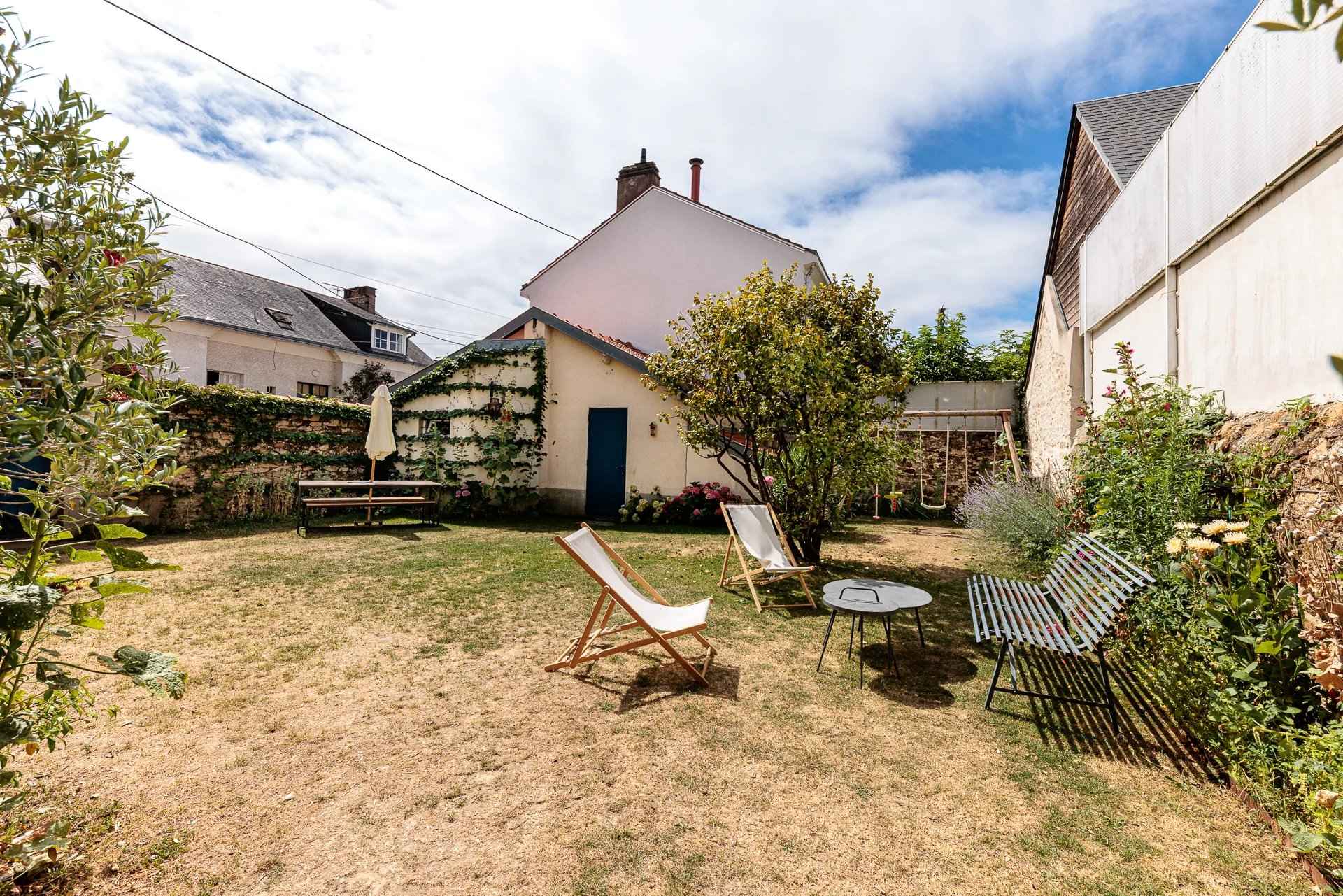 Maison familiale 7 pièces avec jardin 
